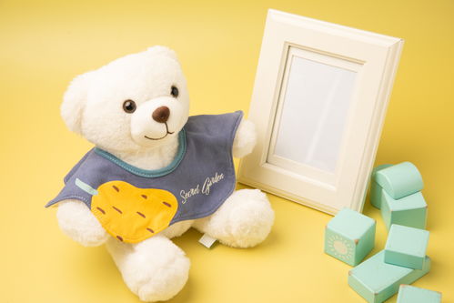 黃色可愛兒童玩偶玩具母嬰用品攝影圖 st攝影